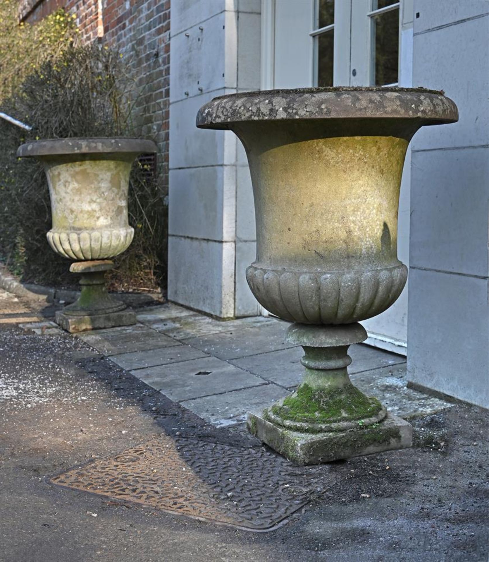 A PAIR OF LARGE STONE COMPOSITION CAMPANA URNS, 20TH CENTURY