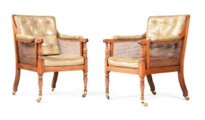 A PAIR OF MAHOGANY, LEATHER AND CANED LIBRARY ARMCHAIRS, SECOND HALF 19TH CENTURY