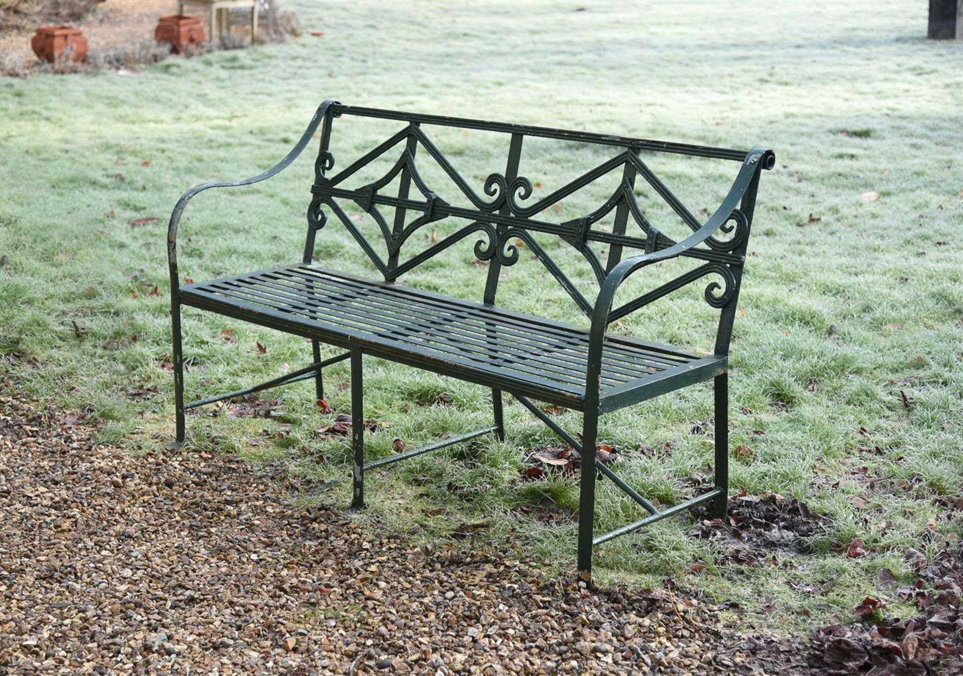 A GREEN PAINTED WROUGHT IRON STRAP WORK GARDEN BENCH, LATE 19TH/EARLY 20TH CENTURY - Image 2 of 2