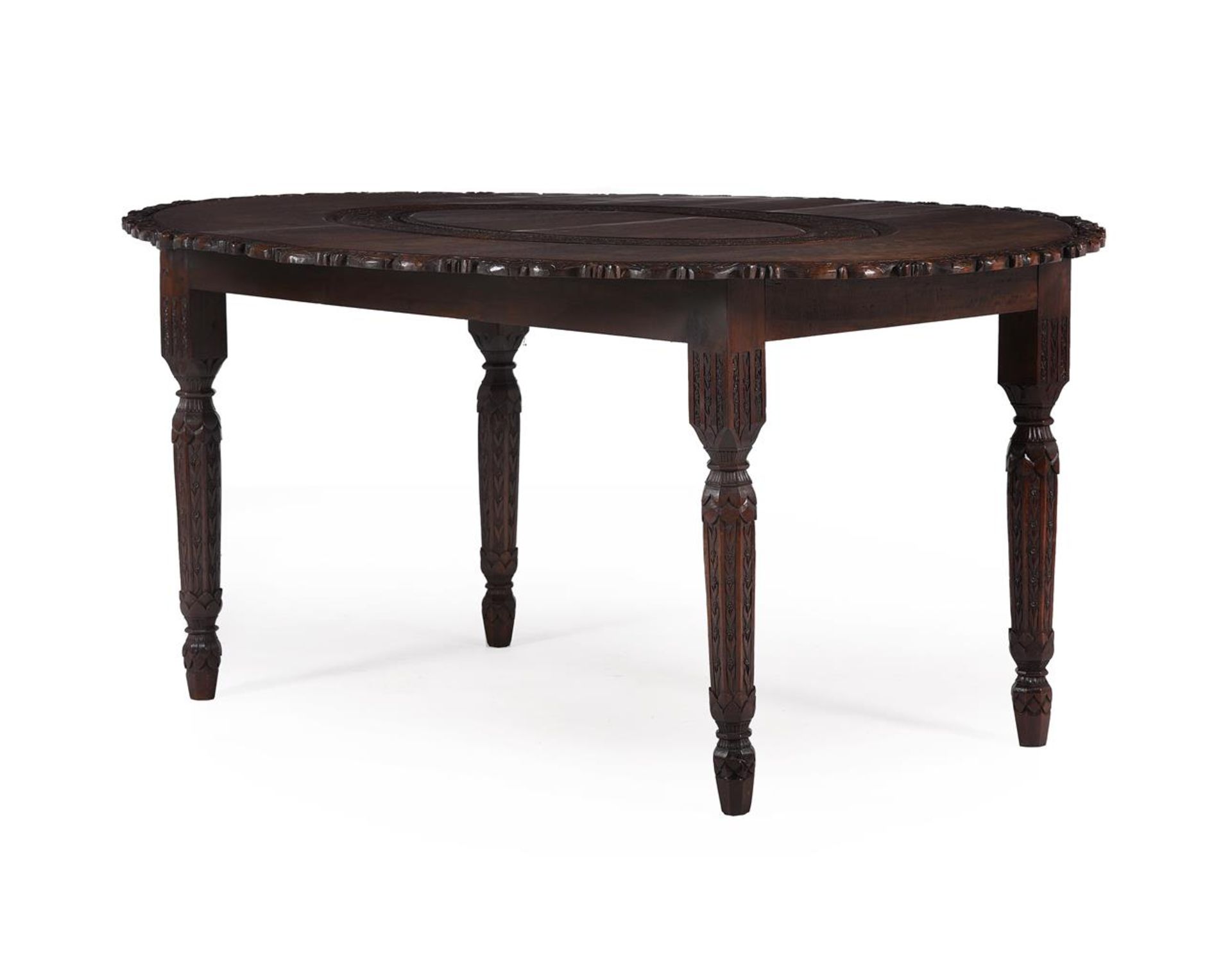 AN ANGLO INDIAN CARVED EXOTIC HARDWOOD CENTRE OR DINING TABLE, 19TH CENTURY