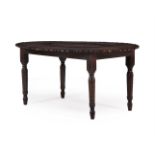 AN ANGLO INDIAN CARVED EXOTIC HARDWOOD CENTRE OR DINING TABLE, 19TH CENTURY