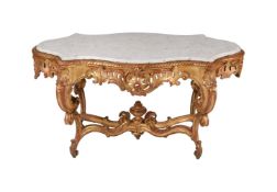 AN ITALIAN CARVED GILTWOOD CENTRE TABLE, MID 19TH CENTURY
