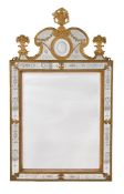 A CONTINENTAL GILT METAL AND ENGRAVED GLASS MIRROR, IN THE MANNER OF PRECHT, 19TH CENTURY