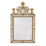 A CONTINENTAL GILT METAL AND ENGRAVED GLASS MIRROR, IN THE MANNER OF PRECHT, 19TH CENTURY