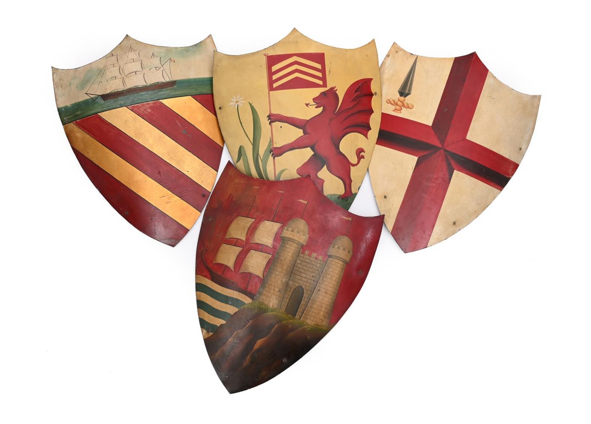 A SET OF FOUR PAINTED TOLE CITY ARMORIAL SHIELDS, EARLY 20TH CENTURY