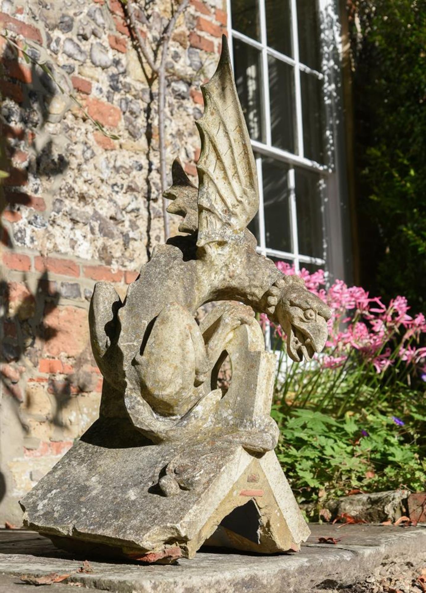 A COMPOSITION STONE GRIFFIN RIDGE TILE FINIAL, LATE 19TH CENTURY - Image 2 of 4