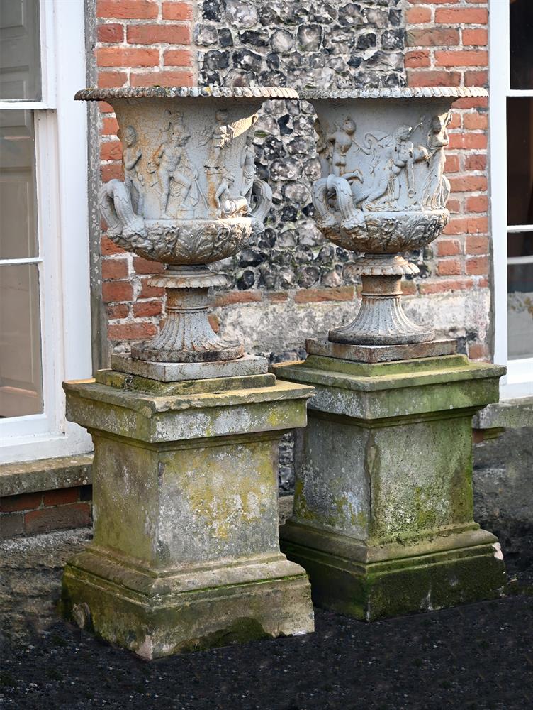 A LARGE PAIR OF VICTORIAN CAST IRON MEDICI AND BORGESE URNS, ATTRIBUTED TO HANDYSIDE