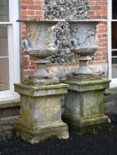 A LARGE PAIR OF VICTORIAN CAST IRON MEDICI AND BORGESE URNS, ATTRIBUTED TO HANDYSIDE
