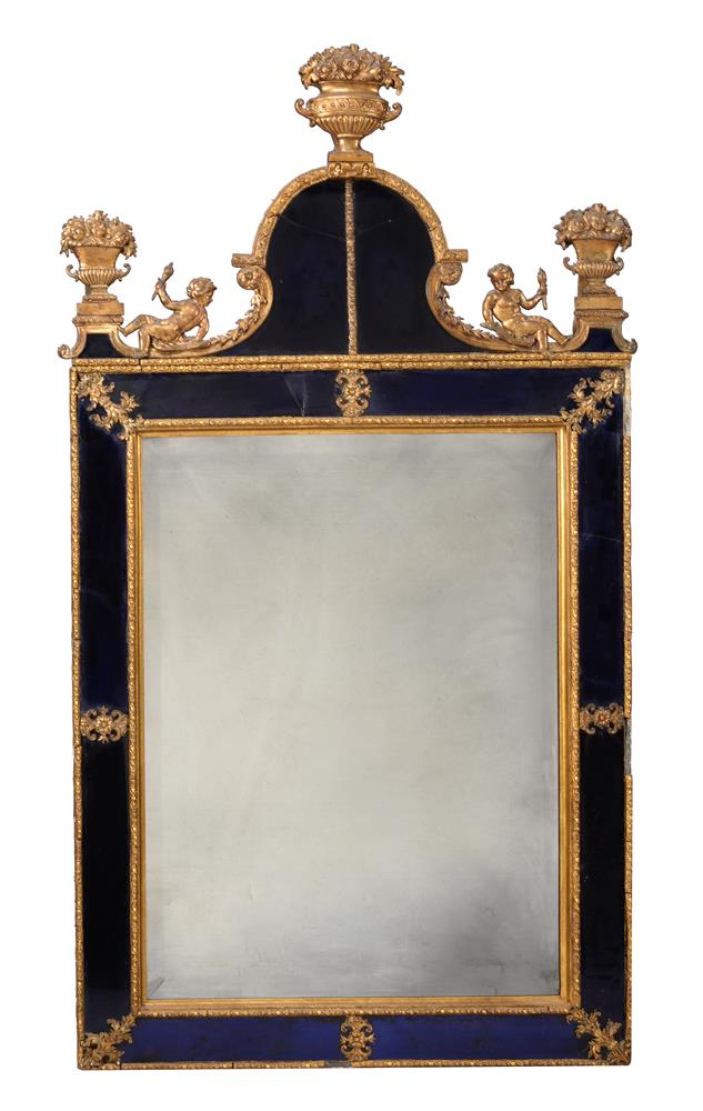 A CONTINENTAL GILT COMPOSITION, GILTWOOD AND BLUE GLASS MOUNTED MIRROR, 19TH CENTURY