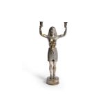 A SILVERED BRASS CANDELABRA IN THE FORM OF AN EGYPTIAN MALE, 20TH CENTURY