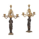 A PAIR OF BARBEDIENNE ORMOLU AND PATINATED BRONZE THREE LIGHT FIGURAL CANDLEABRA, LATE 19TH CENTURY