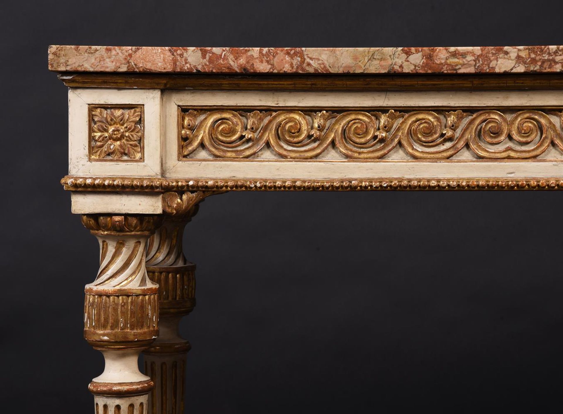 A PAIR OF CONTINENTAL CREAM PAINTED AND PARCEL-GILT CONSOLE TABLES, LATE 18TH/19TH CENTURY - Image 4 of 6