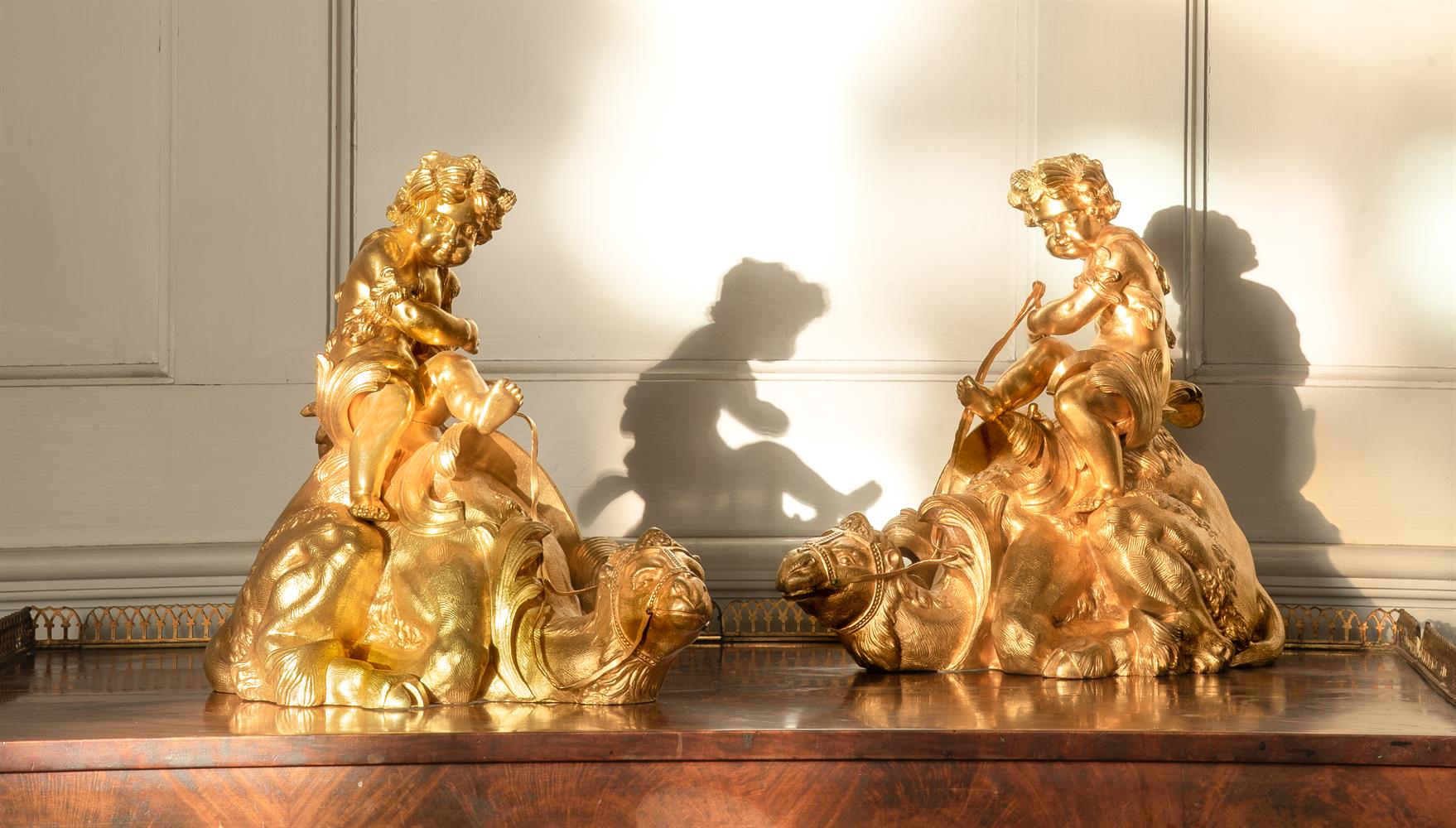 AN UNUSUAL PAIR OF ORMOLU CAMEL CHENETS, LATE 19TH CENTURY, IN THE LOUIS XVI MANNER - Image 4 of 6