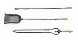 A SET OF THREE EARLY VICTORIAN STEEL AND BRASS HANDLED FIRE TOOLS, THIRD QUARTER 19TH CENTURY