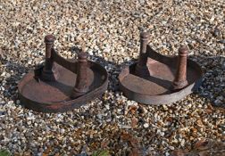 A PAIR OF LATE VICTORIAN PAINTED CAST IRON BOOT-SCRAPES