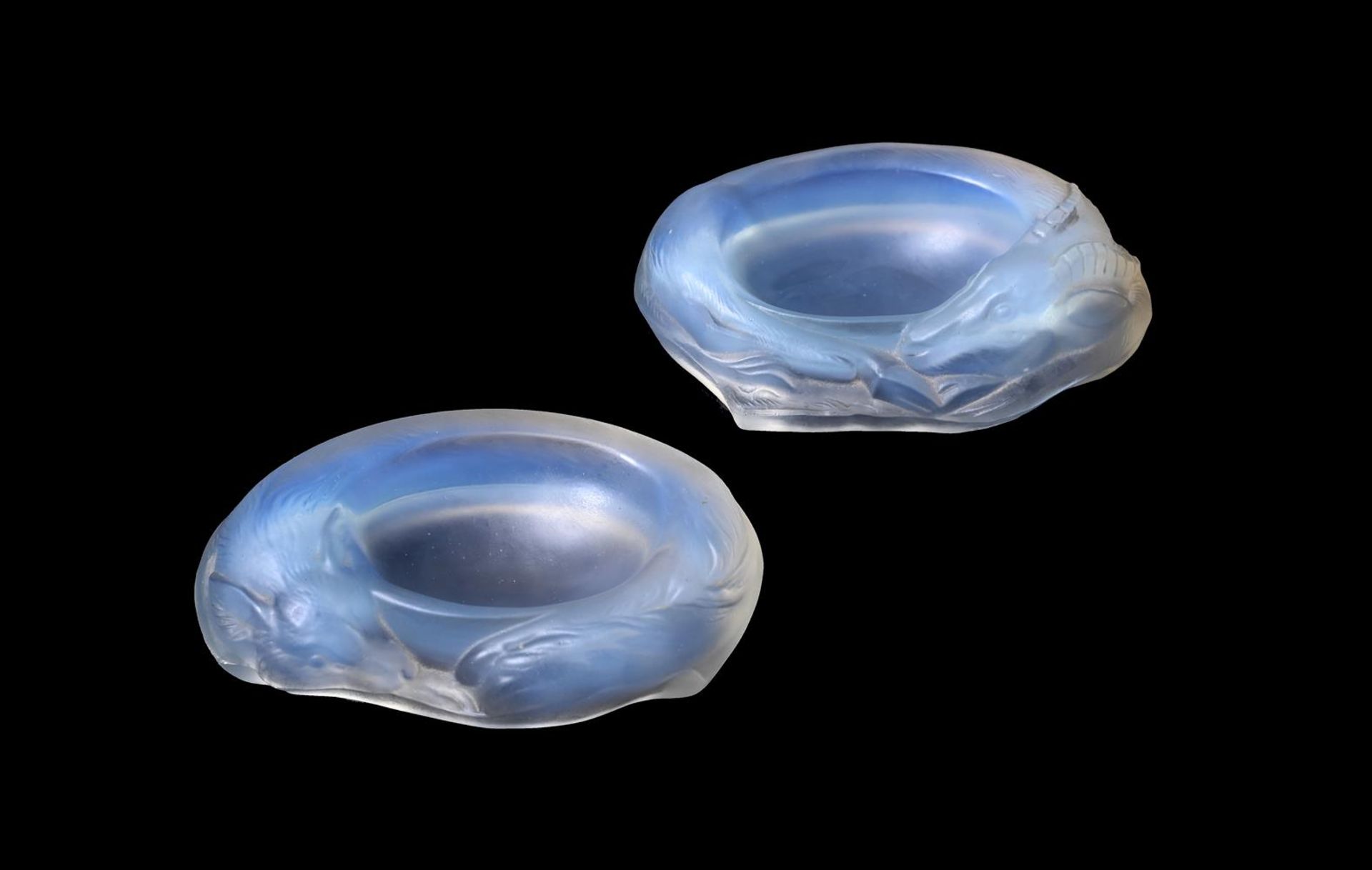 A PAIR OF OPALESCENT CENDRIERS OR TABLE SALTS