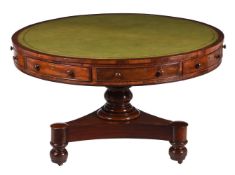 A GEORGE IV MAHOGANY DRUM LIBRARY TABLE