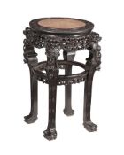 A CHINESE HARDWOOD AND PINK MARBLE INSET JARDINIERE STAND