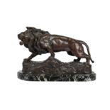 AFTER JOSEPH DESCOMPS (FRENCH, 1872-1948), A BRONZE FIGURE OF A LION