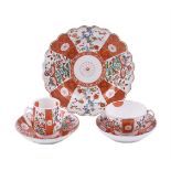 A WORCESTER 'SCARLET JAPAN' PATTERN BELL-SHAPED COFFEE CUP AND SAUCER