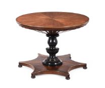 A CONTINENTAL MAHOGANY, EBONISED AND BRASS STRUNG CENTRE TABLE
