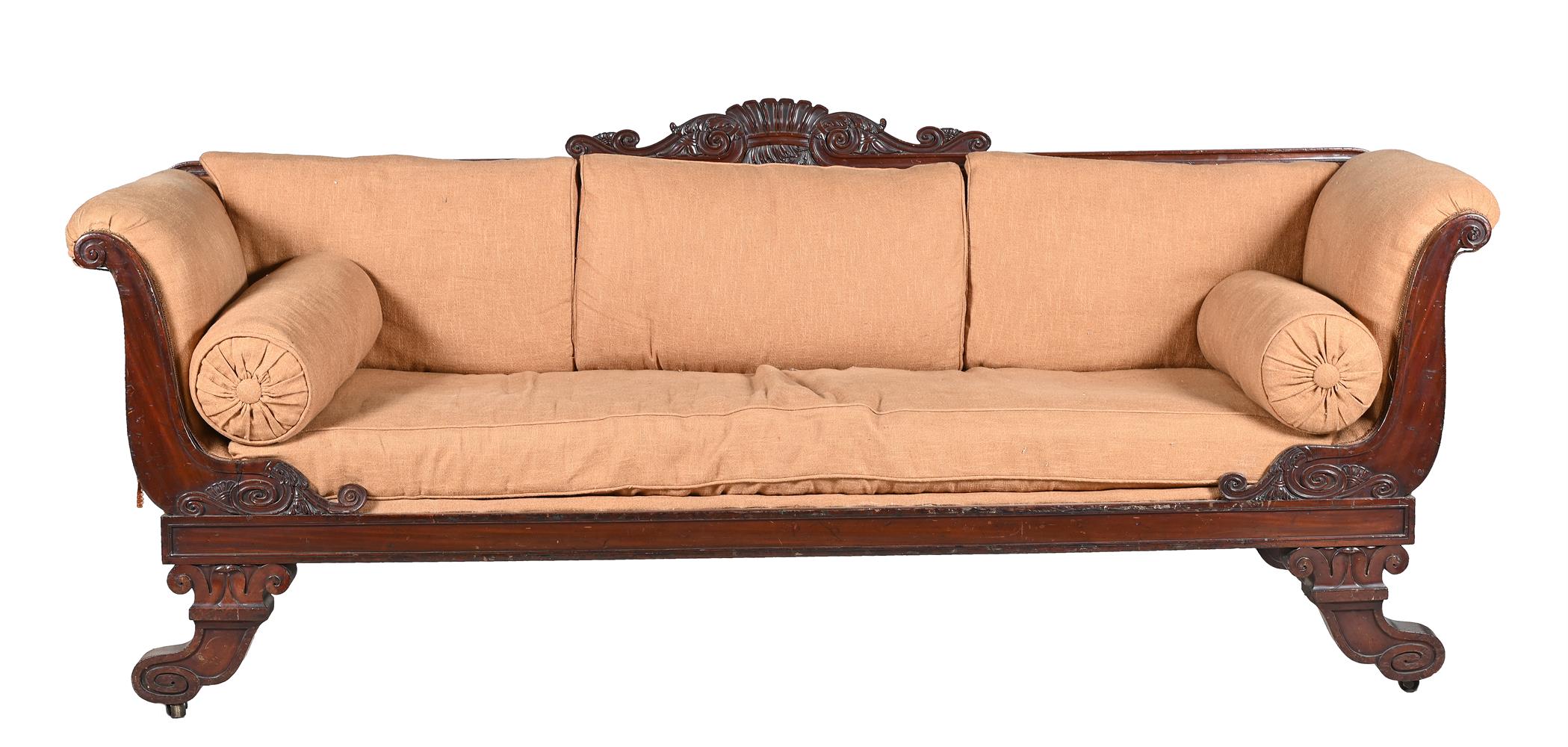 AN EARLY VICTORIAN MAHOGANY SOFA