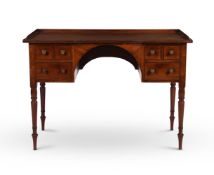 A REGENCY MAHOGANY DRESSING TABLE IN THE MANNER OF GILLOWS