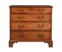 A GEORGE III CHEST OF DRAWERS