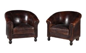 A PAIR OF LEATHER UPHOLSTERED TUB ARMCHAIRS