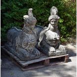 A PAIR OF COMPOSITION STONE SPHINGES ON PEDESTAL BASES