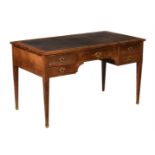 A FRENCH WALNUT WRITING TABLE IN LOUIS PHILIPPE STYLE