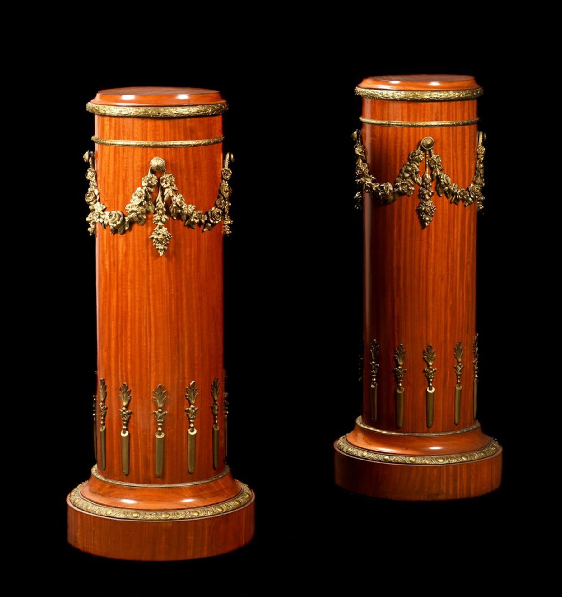 A PAIR OF SATINWOOD AND GILT METAL MOUNTED TORCHERES IN LOUIS XVI STYLE