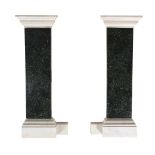 TWO GREEN FOSSILISED OPPOSING MARBLE FIRE SURROUNDS
