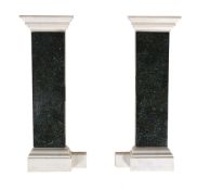 TWO GREEN FOSSILISED OPPOSING MARBLE FIRE SURROUNDS