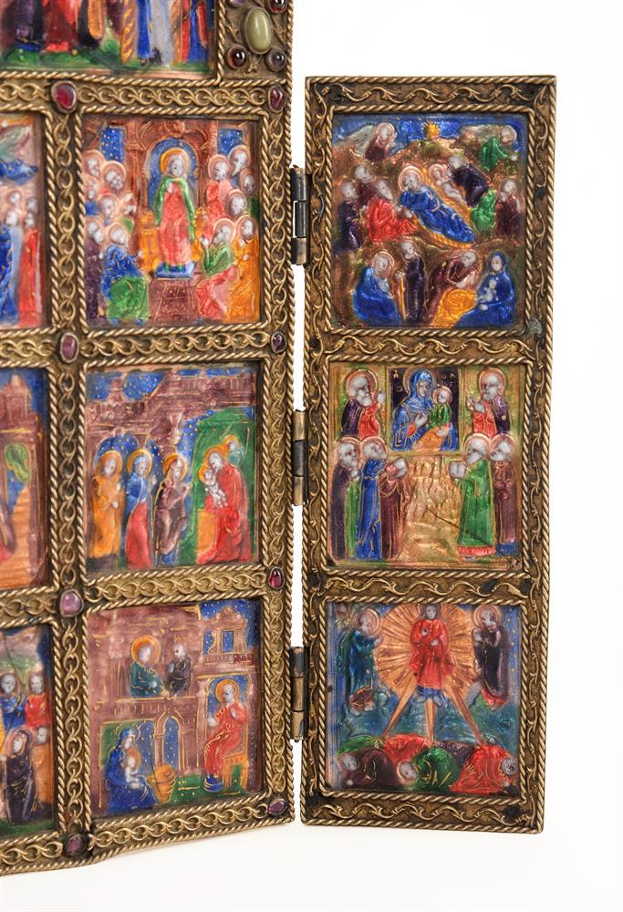 AN ENAMEL SET FOLDING DEVOTIONAL TRIPTYCH IN THE EARLY 16TH CENTURY LIMOGES...