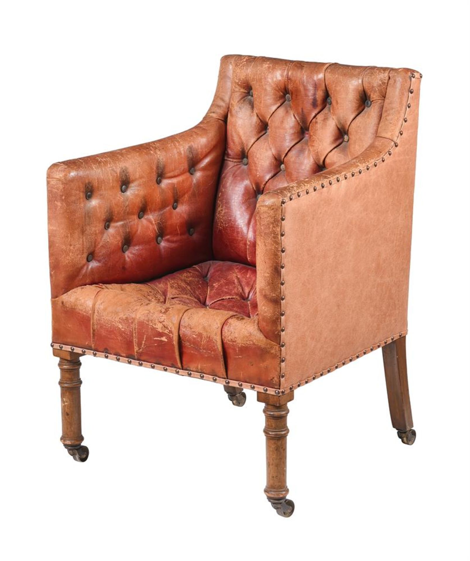 A MAHOGANY AND MOROCCO LEATHER LIBRARY ARMCHAIR IN GEORGE III STYLE
