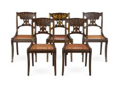 A SET OF FOUR BROWN PAINTED AND PARCEL GILT SIDE CHAIRS