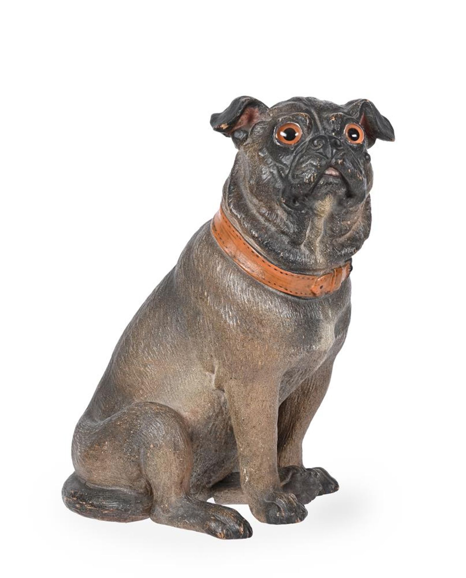 AN AUSTRIAN COLD PAINTED TERRACOTTA MODEL OF A SEATED PUG