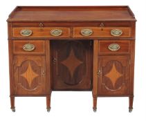 AN EDWARDIAN MAHOGANY AND LINE INLAID DRESSING TABLE