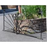 A PAIR OF BLACK PAINTED CAST IRON GARDEN GATES IN ART DECO STYLE