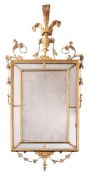 A RECTANGULAR GILTWOOD MIRROR IN GEORGE III ADAM STYLE