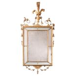 A RECTANGULAR GILTWOOD MIRROR IN GEORGE III ADAM STYLE