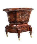 A CARVED HARDWOOD WINE COOLER OR CENTRE PIECE IN WILLIAM IV STYLE20TH CENTURYAfter the design by S