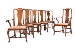 A SET OF FIVE GEORGE II WALNUT DINING CHAIRS