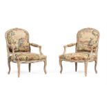 A PAIR OF FRENCH PAINTED AND PARCEL GILT FAUTEUILS