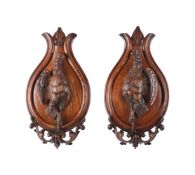 A PAIR OF AUSTRO-GERMAN CARVED OAK WALL PLAQUES OF GAME