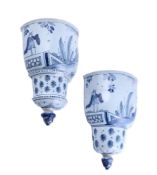 A PAIR OF ENGLISH DELFT BLUE AND WHITE WALL POCKETS