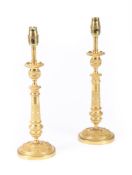 A PAIR OF GILT METAL TABLE LAMPS
