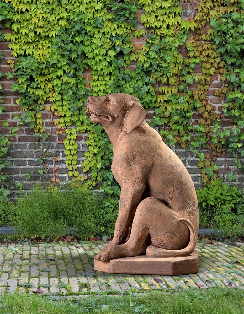 ‡ A VENETIAN TERRACOTTA MODEL OF A SEATED HOUND