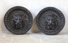 ‡ A PAIR OF CAST IRON FOUNTAIN MASKS